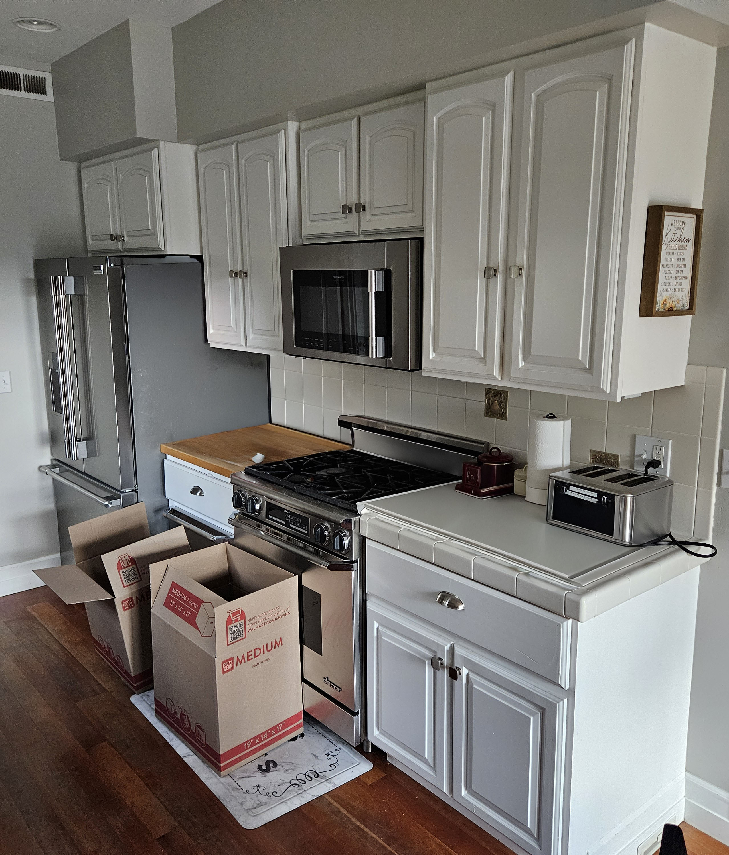 Before photo showing kitchen remodel conditions